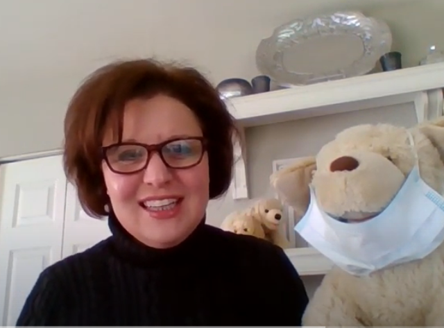 Video: Miss Amy and mama puppy practice the alphabet